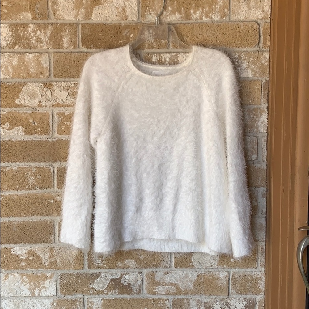 White fuzzy sweater
